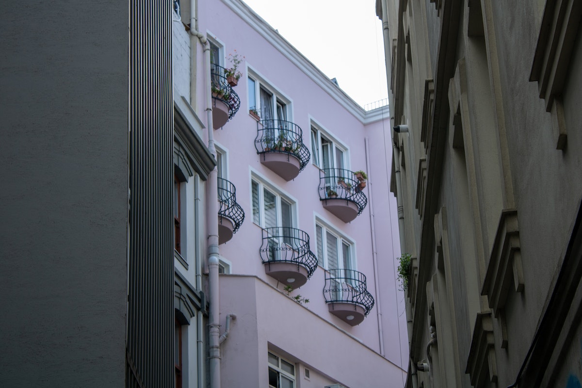 Balconies-on-buildings-pink-wall